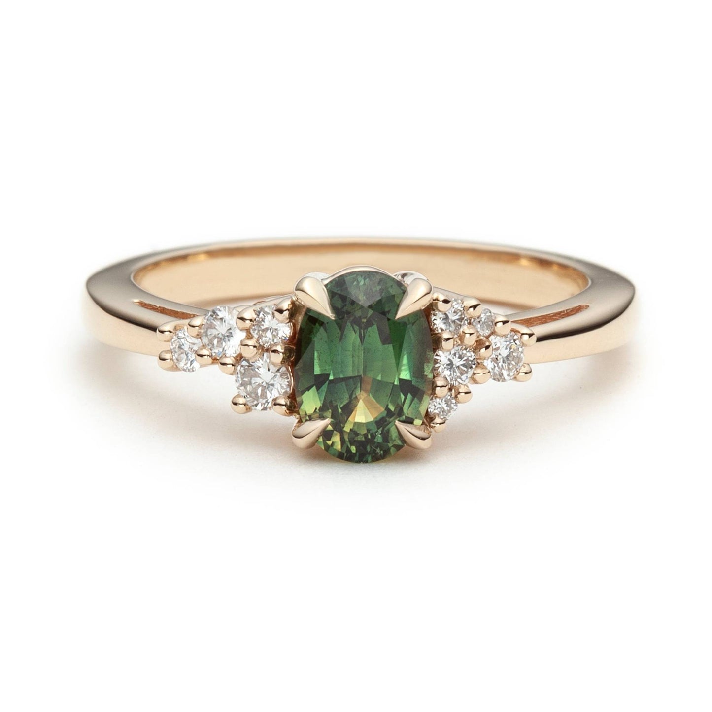 Asymmetric parti sapphire and diamond engagement ring