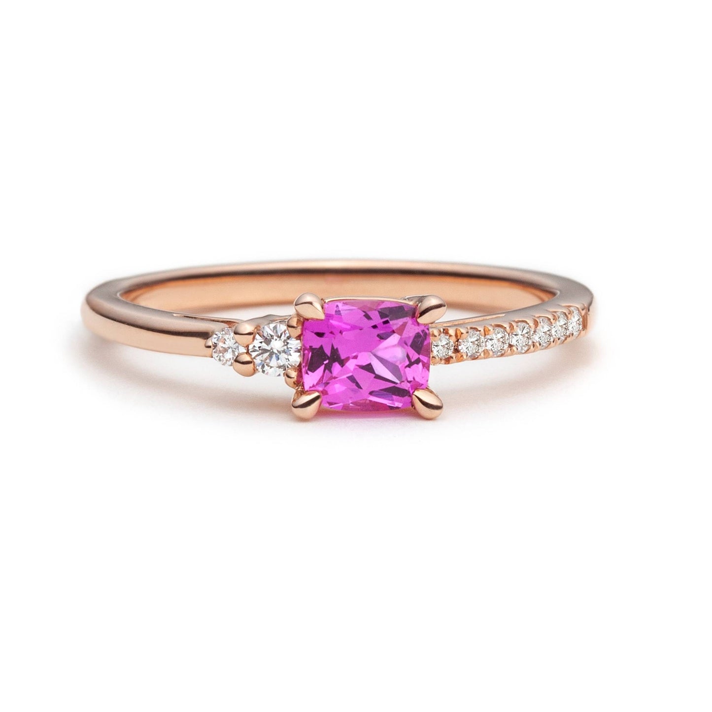 Bright pink sapphire and diamond asymmetric ring