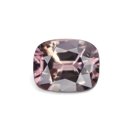 2.05ct unheated antique cushion cut brownish-pink sapphire from Madagascar, loose stone on white background showing faceting and colour