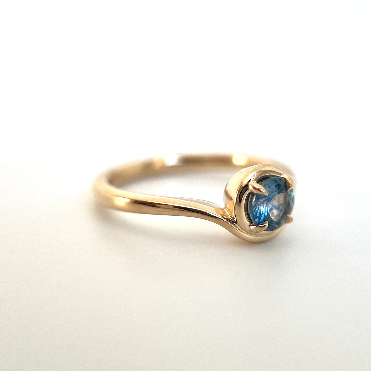 One of a Kind Round Blue Sapphire Solitaire