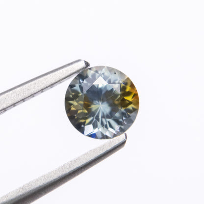 0.76ct Round Brilliant Cut, Light Yellow-Blue Parti Sapphire From Montana