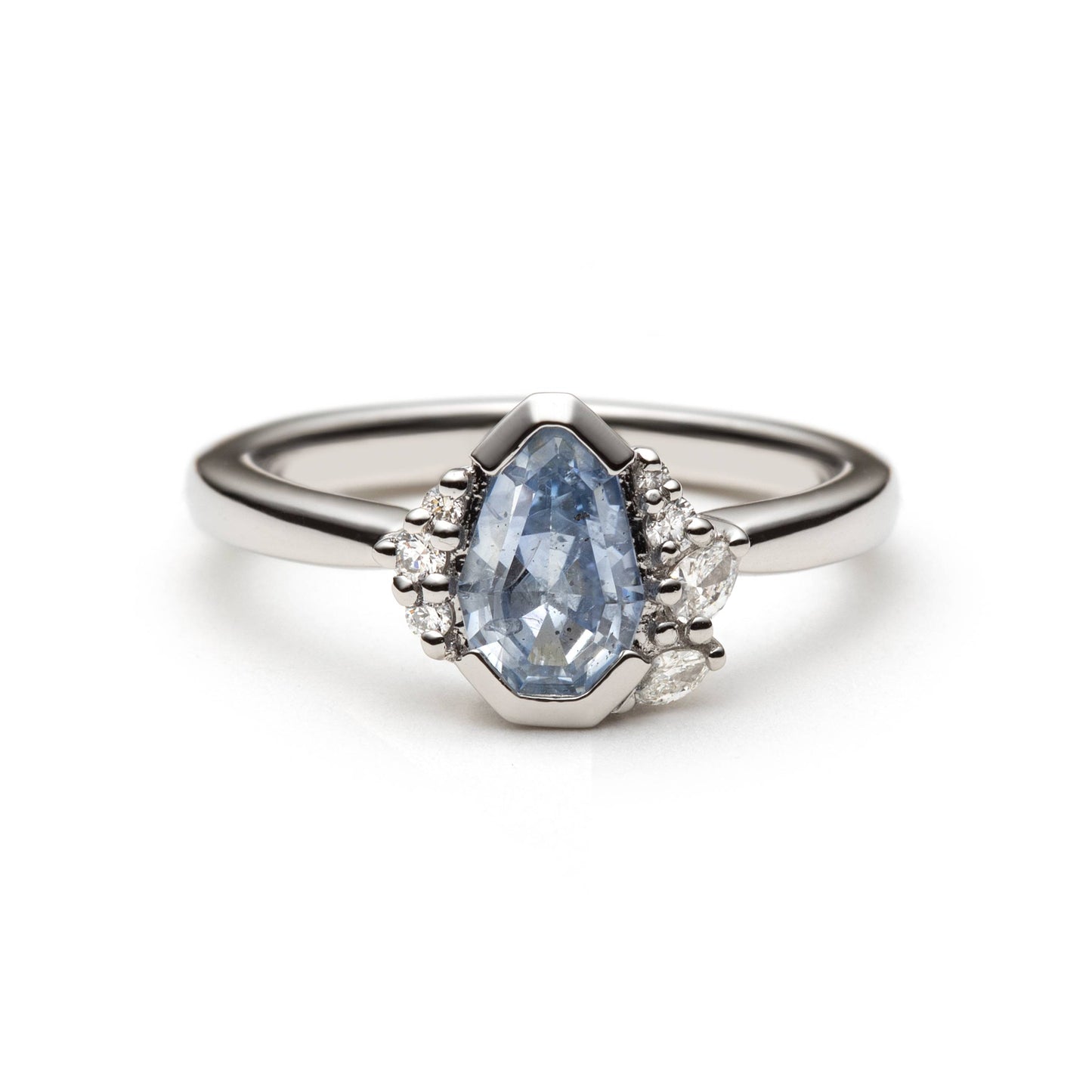 Platinum ring with 1.17ct light blue pear-shaped sapphire and diamond accents