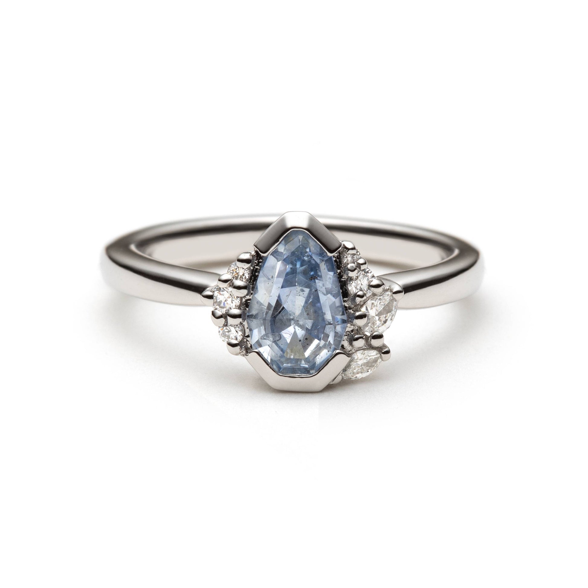 Platinum ring with 1.17ct light blue pear-shaped sapphire and diamond accents