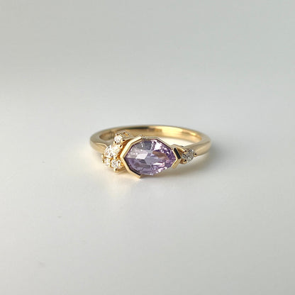 1.14ct purple sapphire pear-shaped step cut from Sri Lanka, set in half-bezel design