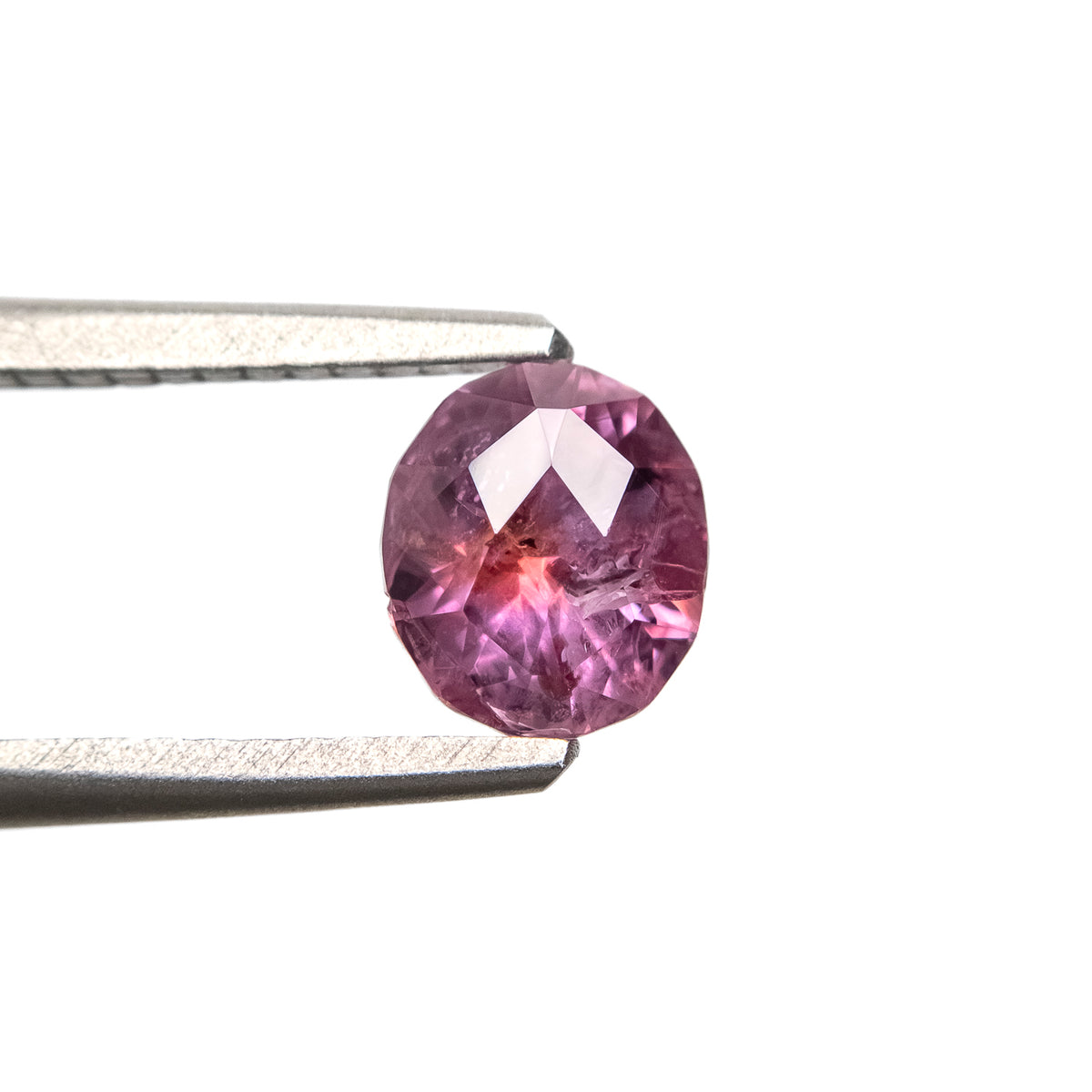 1.09ct Oval Bi Color Pink & Orange Heated Sapphire From Montana, USA