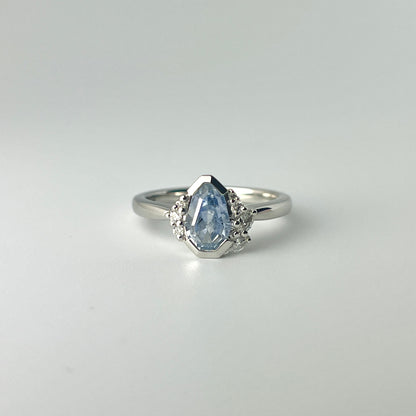 Platinum ring with 1.17ct light blue pear-shaped sapphire and diamond accents
