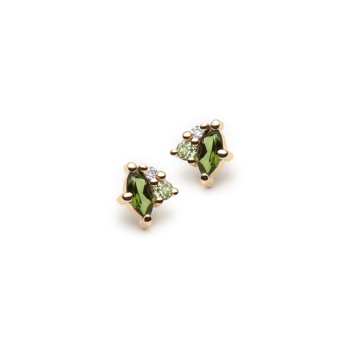 Green gemstone stud earrings in yellow gold featuring a cluster of marquise shaped green tourmalines, round peridots and diamonds. Earrings are shot on a white background. 