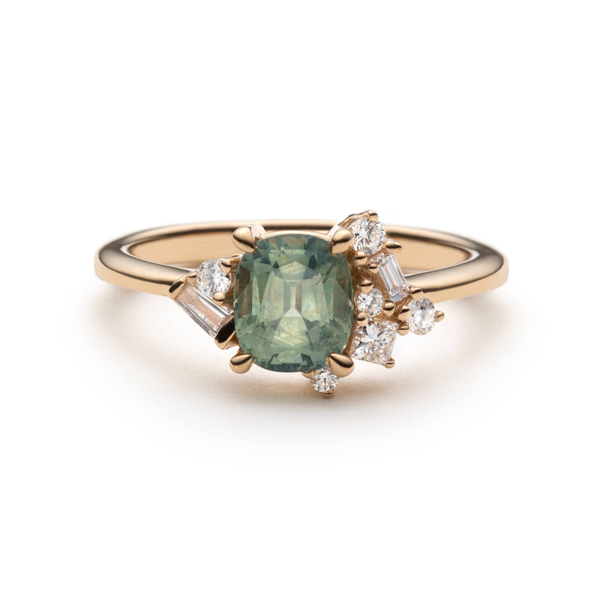 1.47ct unheated cushion cut green Montana sapphire and diamond cluster ring in 14k yellow gold, front view showing asymmetric diamond setting