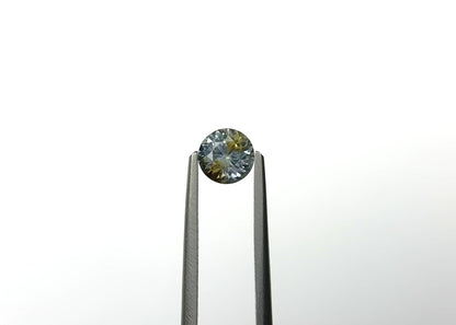 0.76ct Round Brilliant Cut, Light Yellow-Blue Parti Sapphire From Montana