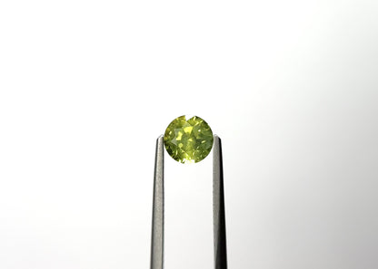 1.35ct Light Yellowish-Green Round Sapphire from Madagascar