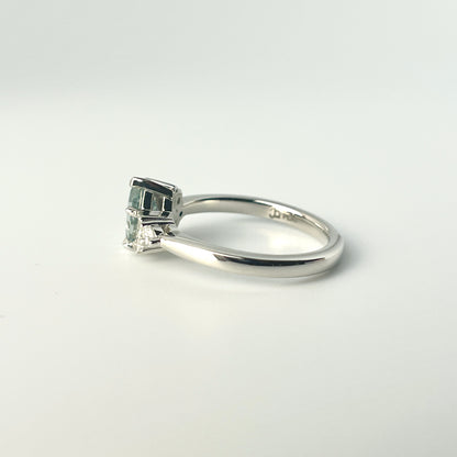 1.27ct step-cut pear shape teal Madagascar sapphire and diamond ring in platinum, profile view showing band width and setting heigh