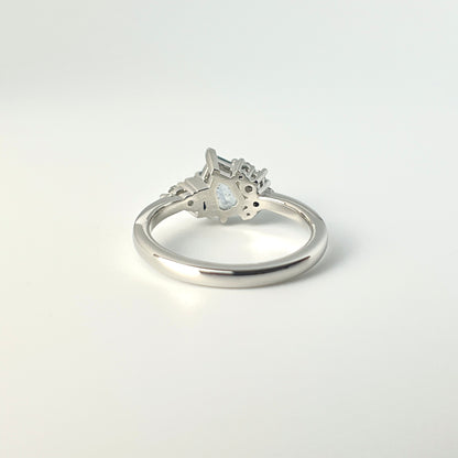 1.27ct step-cut pear shape teal Madagascar sapphire and diamond ring in platinum, underside view showing setting construction and band detail