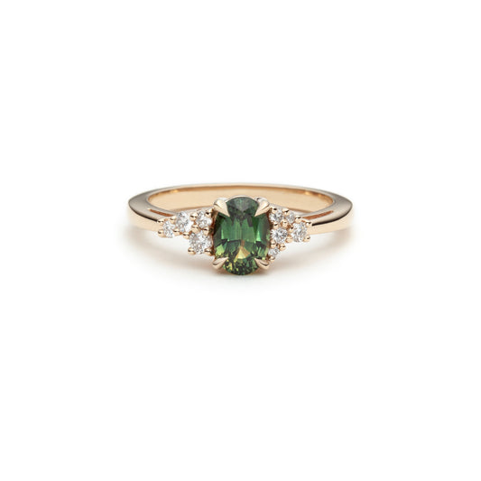 Asymmetric parti sapphire and diamond engagement ring