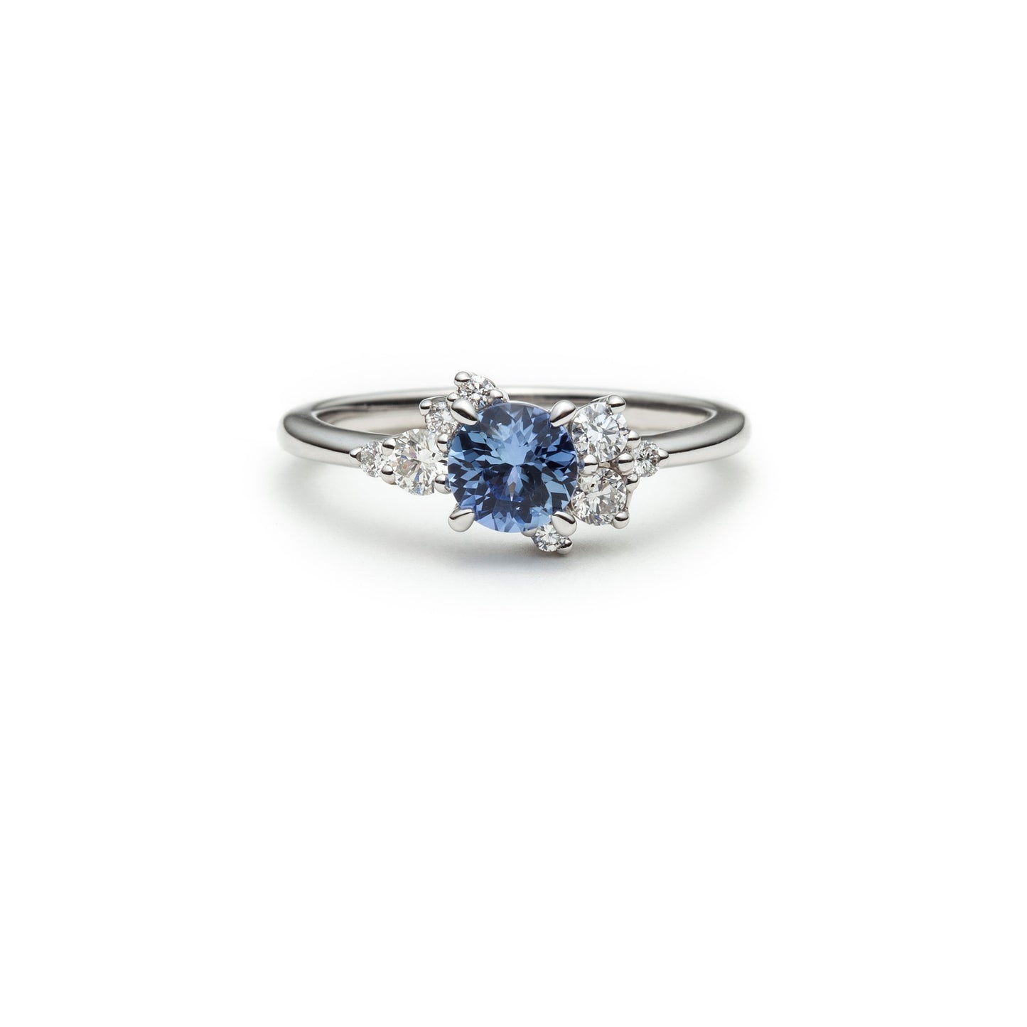 One of a kind light blue sapphire and diamond asymmetric ring