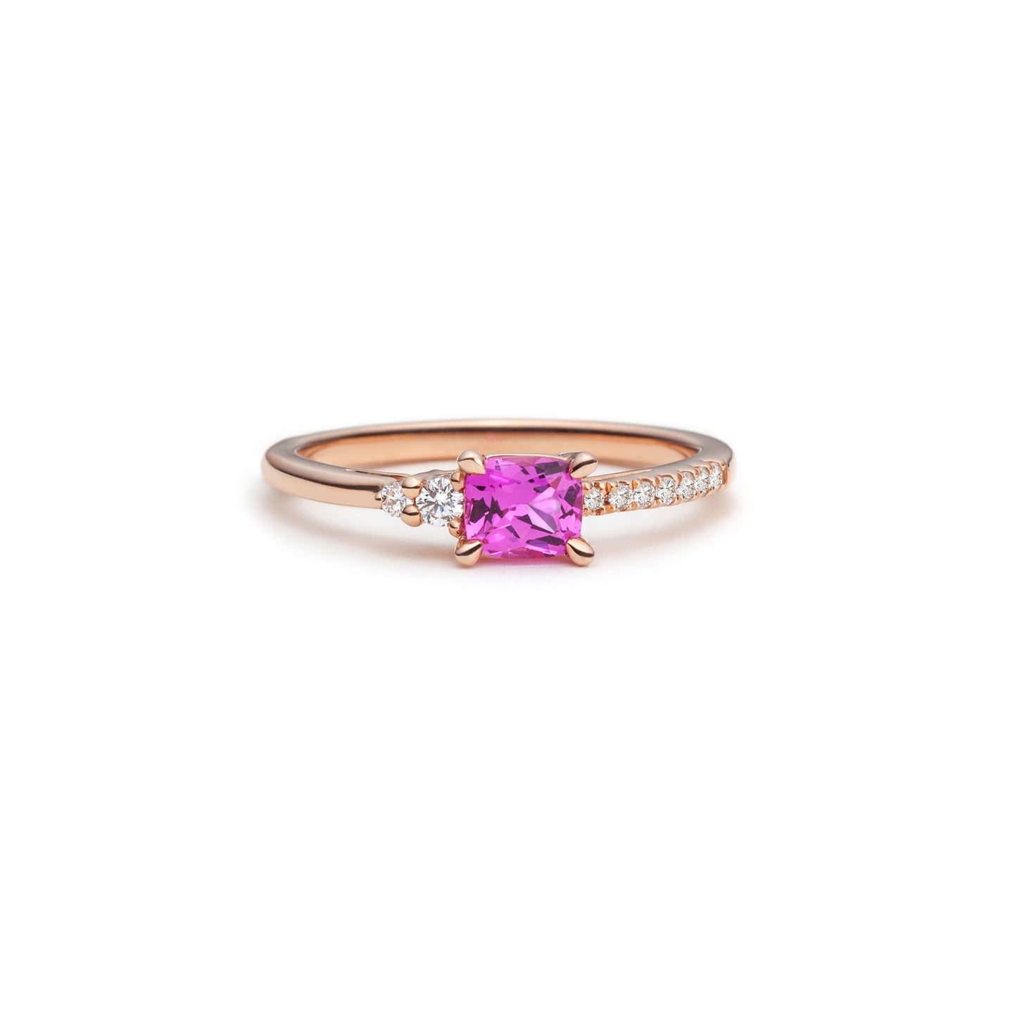 Bright pink sapphire and diamond asymmetric ring
