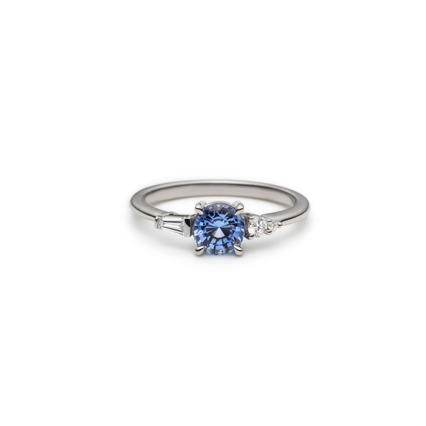One of a Light Blue Sapphire and Diamond Asymmetric Ring